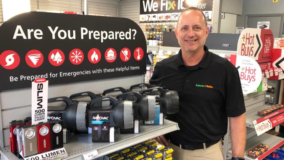 Many local businesses were geared up for the disaster preparedness sales tax holiday in this 2020 file photo. Shown is Rich Epps of Batteries Plus in Bradenton.