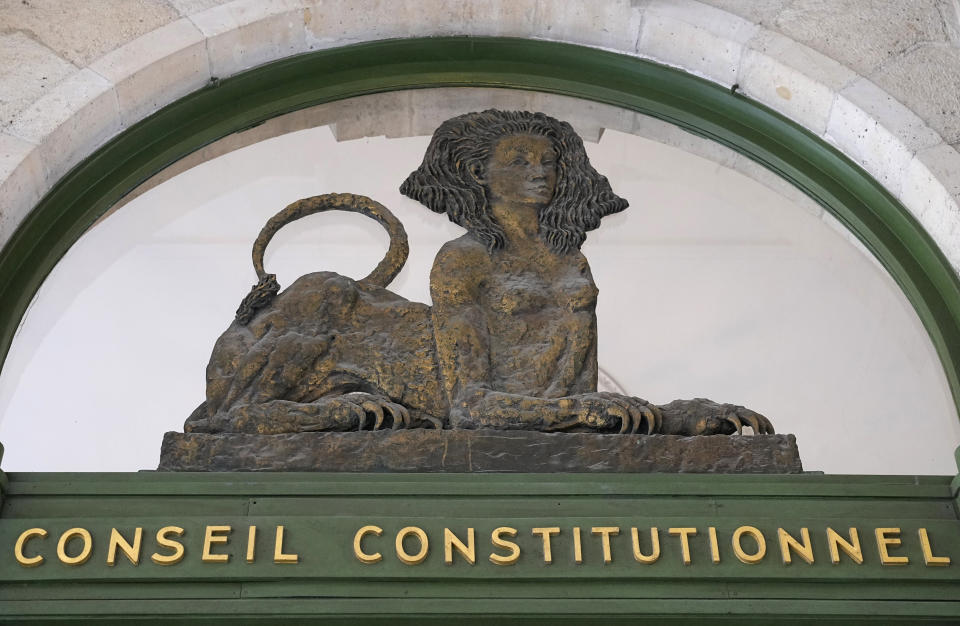 A sculpture atop the entrance of the Constitutional Council is pictured in Paris, France, Wednesday, April 12, 2023. The body' role is to make sure a bill is in line with the Constitution prior to enactment. French unions have staged Thursday a new round of nationwide protests, one day before an expected ruling of the country’s top constitutional body they hope will bring a halt to President Emmanuel Macron’s unpopular pension plan. (AP Photo/Michel Euler)