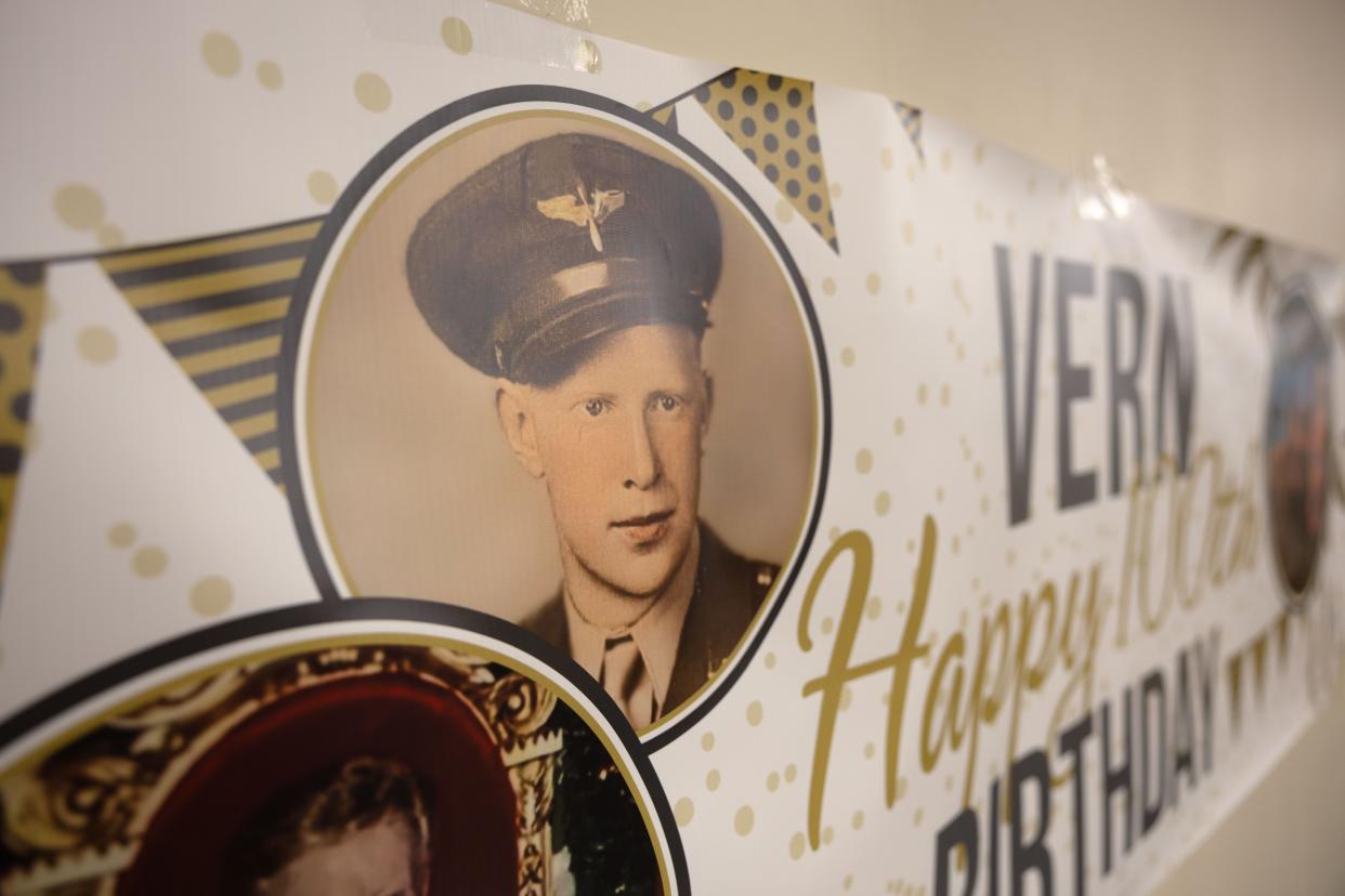 A photo of a young Vernon Roen in his United States Army Air Corps uniform adorned a banner at the 100th birthday celebration event held in his honor Saturday, Feb. 10, 2024, at the Ravenna VFW.