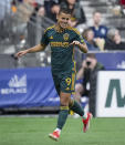 LA Galaxy's Dejan Joveljic celebrates his goal against the Vancouver Whitecaps during the second half of an MLS soccer match Saturday, April 13, 2024, in Vancouver, British Columbia. (Darryl Dyck/The Canadian Press via AP)