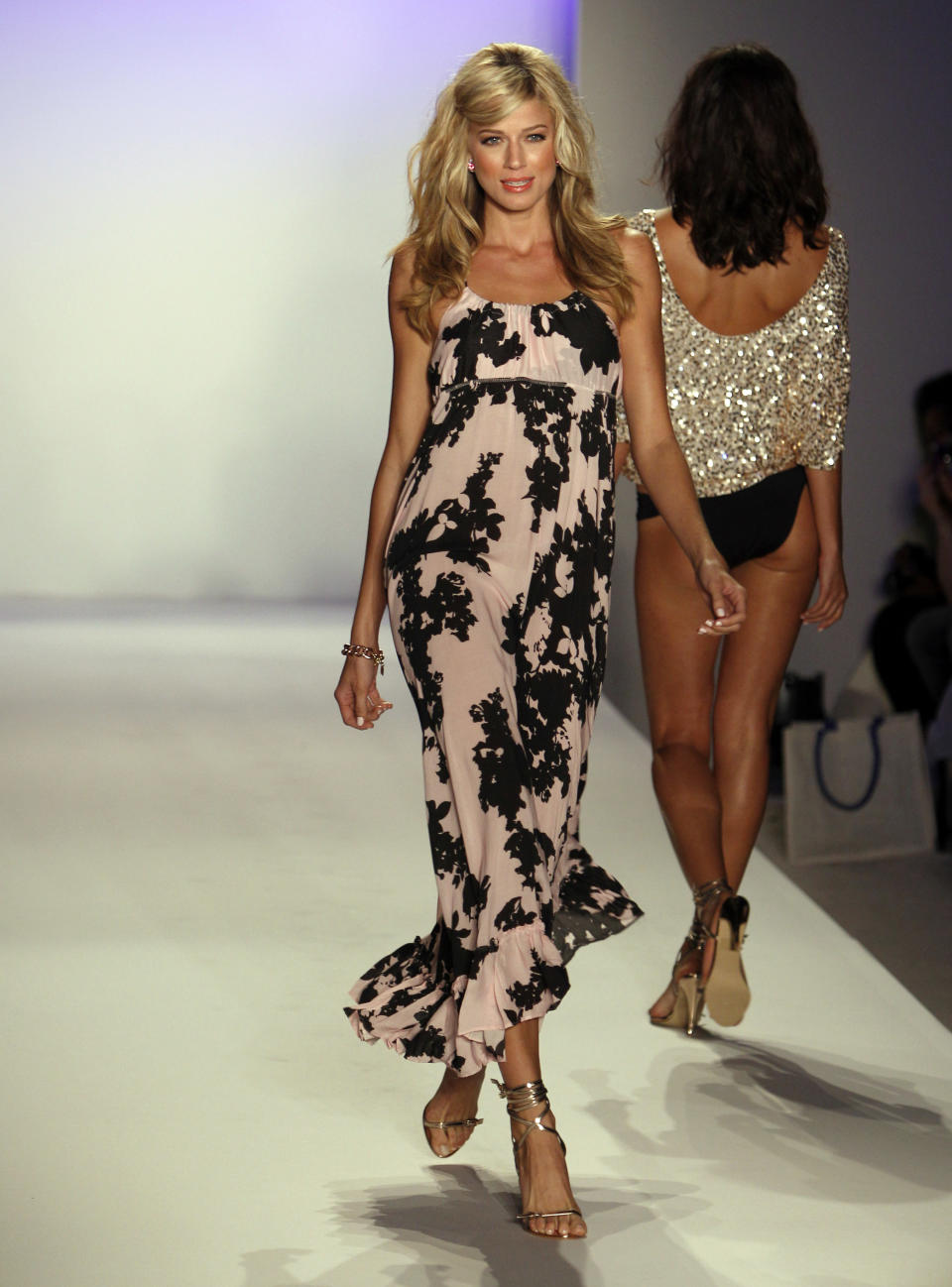 Models wear swimwear from the collection of White Sands Australia during the Mercedes-Benz Fashion Week Swim 2013 show, Sunday, July 22, 2012, in Miami Beach, Fla. (AP Photo/Lynne Sladky)