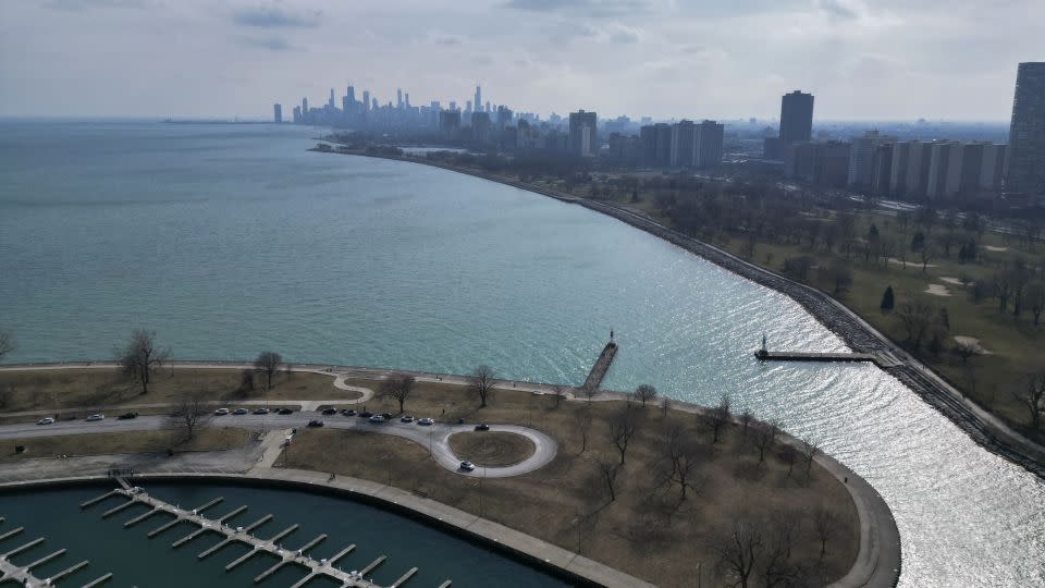 Sunlight reflects off of Lake Michigan at Montrose Harbor on an unseasonably warm day, Tuesday, Feb. 27, 2024, in Chicago. - Erin Hooley/AP