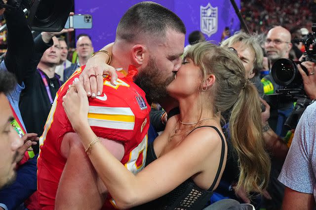 <p>Erick W. Rasco/Sports Illustrated via Getty</p> Travis Kelce and Taylor Swift following Kansas City Chiefs Super Bowl victory against San Francisco 49ers at Allegiant Stadium on February 11, 2024