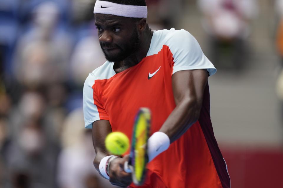 Frances Tiafoe of the U.S. returns a shot against Kwon Soon-woo of South Korea during their semifinal match in the Japan Open tennis championships in Tokyo, Saturday, Oct. 8, 2022. (AP Photo/Hiro Komae)