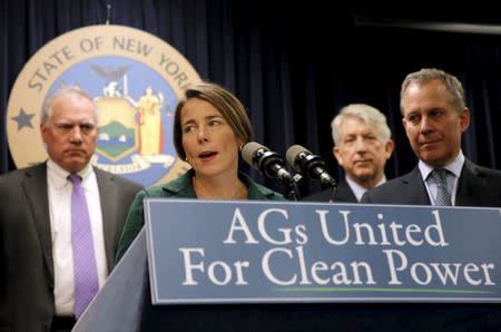 Massachusetts Attorney General Maura Healey (C) speaks at a news conference with New York Attorney General Eric Schneiderman (R) and other U.S. State Attorney's General to announce a state-based effort to combat climate change in the Manhattan borough of New York City, March 29, 2016. REUTERS/Mike Segar