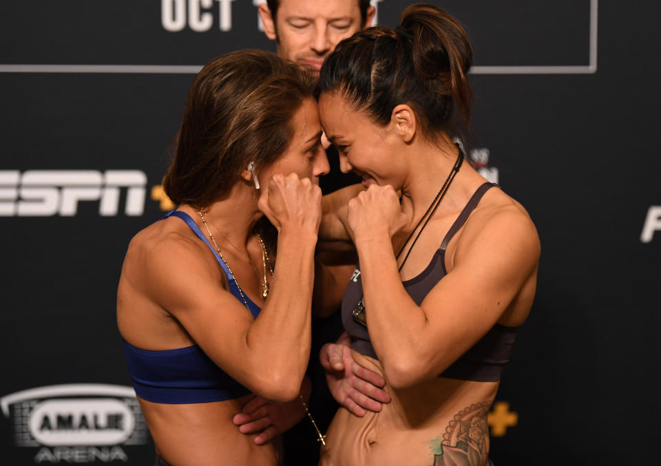 TAMPA, FLORIDA - OCTOBER 11:   (L-R) Opponents Joanna Jedrzejczyk of Poland and Michelle Waterson face off during the UFC Fight Night weigh-in at the Westin Tampa Waterside on October 11, 2019 in Tampa, Florida. (Photo by Josh Hedges/Zuffa LLC/Zuffa LLC)