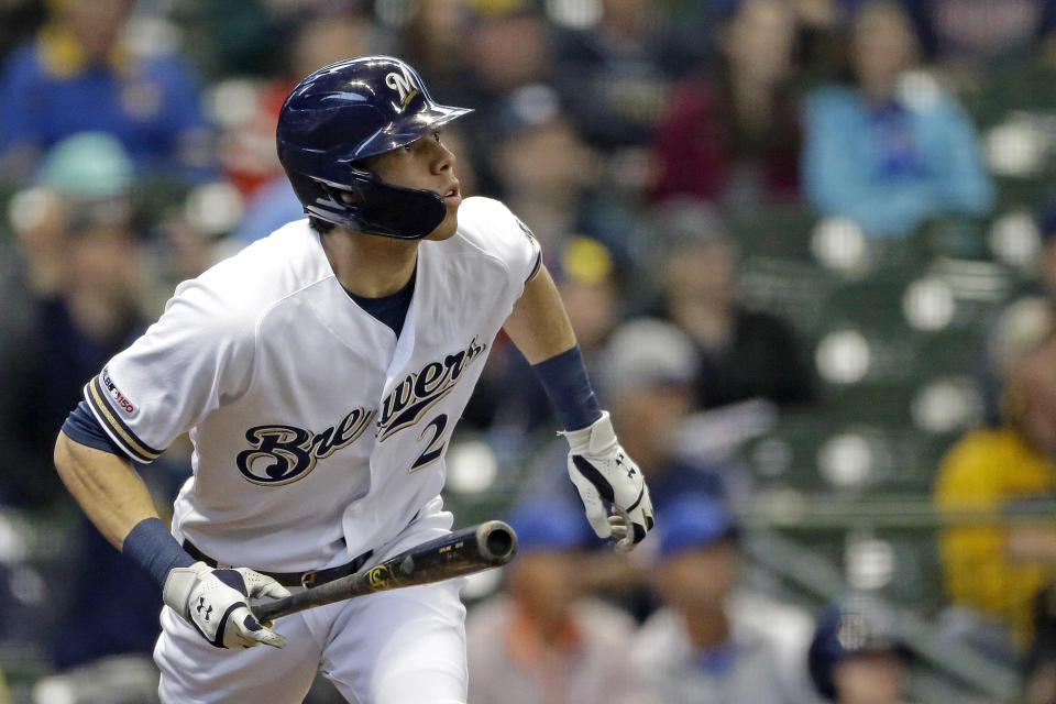 Milwaukee Brewers' Christian Yelich watches the ball after hitting a solo home run during the first inning of a baseball game against the Washington Nationals Wednesday, May 8, 2019, in Milwaukee. (AP Photo/Aaron Gash)