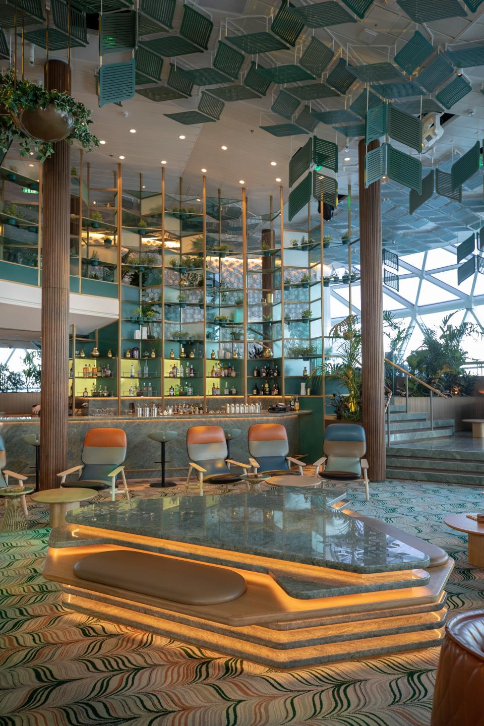 Scott Butler teamed up with Spanish furniture designer Patricia Urquiola on the design of Eden, an edgy restaurant and performance venue unlike anything at sea. It also features a "library of plants."