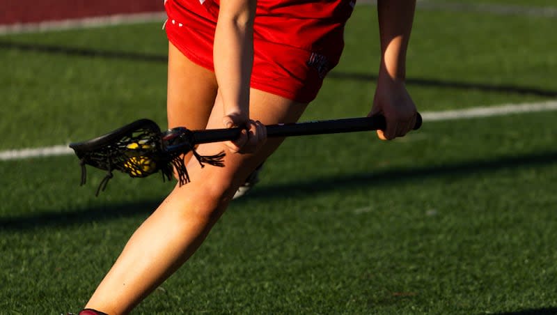 Lone Peak plays Mountain Ridge in a high school girls lacrosse game at Lone Peak High School in Highland on Tuesday, March 19, 2024.