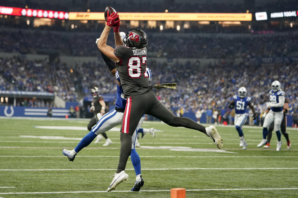 Tampa Bay Buccaneers tight end Payne Durham (87) catches the ball during the first half of an NFL football game against the Indianapolis Colts Sunday, Nov. 26, 2023, in Indianapolis. (AP Photo/Michael Conroy)