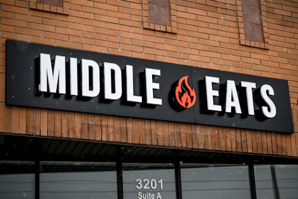 The sign outside the entrance to Middle Eats on East Grand River Avenue on Monday, March 18, 2024, in East Lansing.