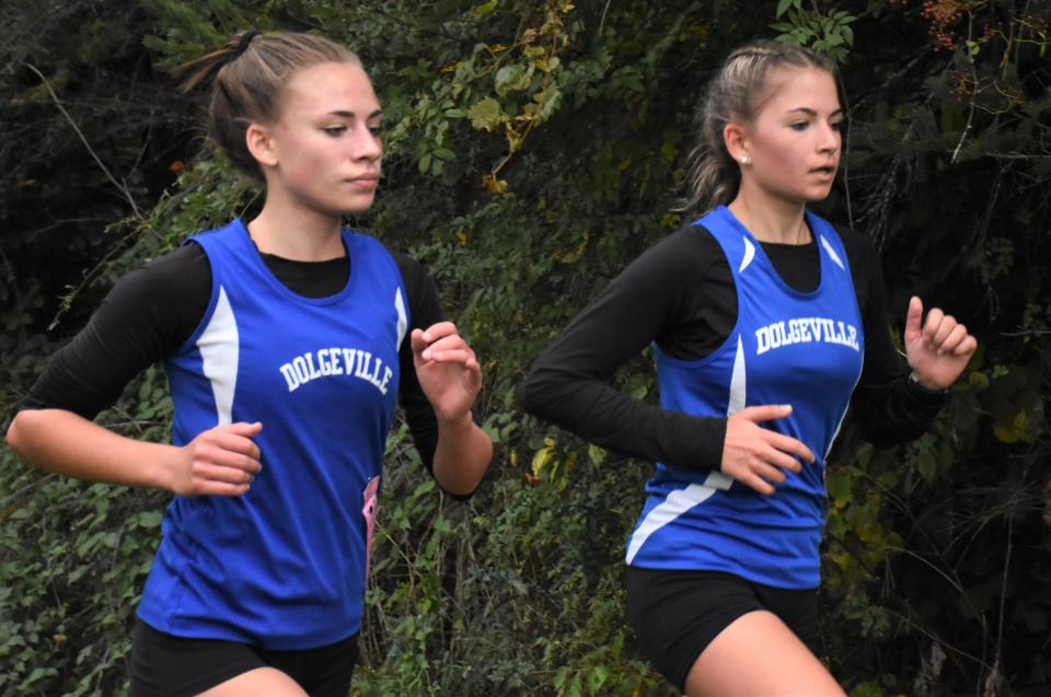 Dolgeville teammates Grace Seeley and Celine Juchheim (from left) ran to a 1-2 finish among the girls at a five-team dual meet Wednesday in Little Falls.