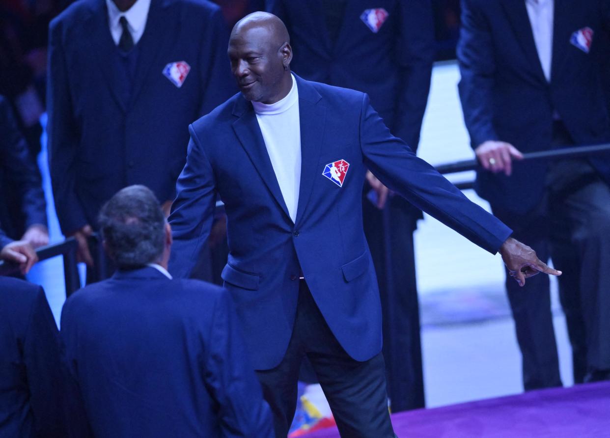 Michael Jordan arrives for the NBA 75th Anniversary Team celebration during halftime of the NBA All-Star Game at Rocket Mortgage FieldHouse in Cleveland on Feb. 20, 2022. (Kyle Terada/USA TODAY Sports)