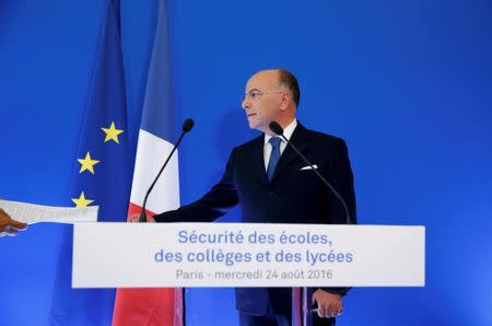 French Interior Minister Bernard Cazeneuve attends a news conference to announce security plans for schools, in Paris, France, August 24, 2016. REUTERS/Pascal Rossignol