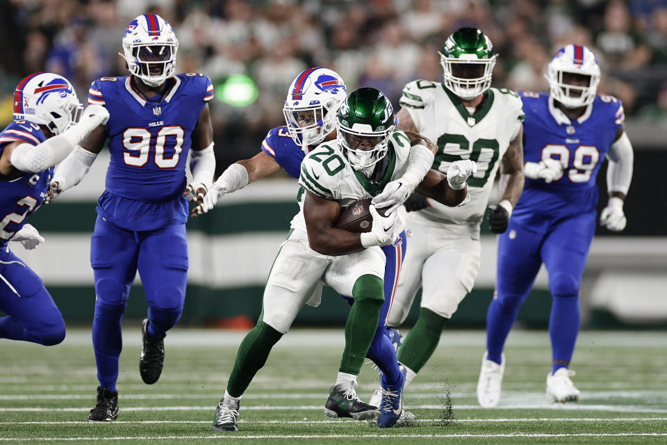 Buffalo Bills linebacker Terrel Bernard (43) tackles New York Jets running back Breece Hall (20) during the third quarter of an NFL football game, Monday, Sept. 11, 2023, in East Rutherford, N.J. (AP Photo/Adam Hunger)