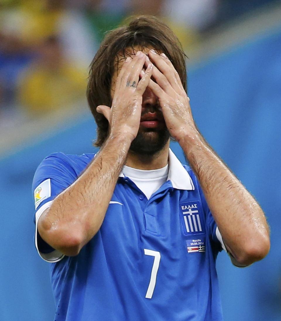 Greece's Giorgios Samaras reacts during their 2014 World Cup round of 16 game against Costa Rica at the Pernambuco arena in Recife June 29, 2014. REUTERS/Yves Herman