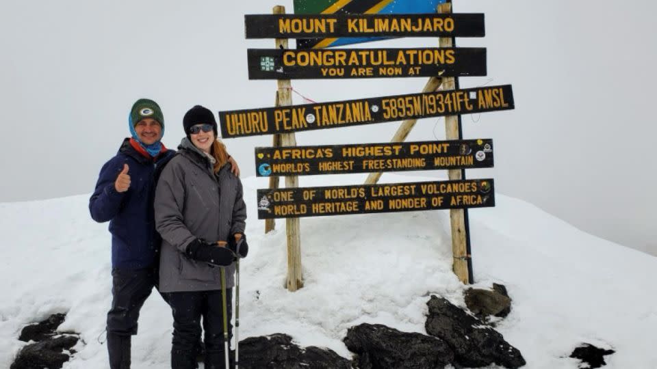 Adrian and Laura still enjoy embarking on adventures, here they are at the top of Kilimanjaro. - Adrian and Laura