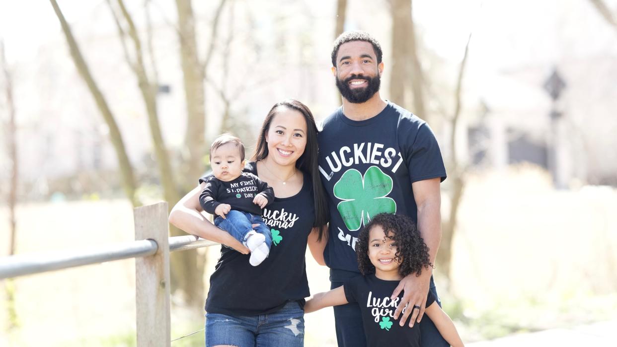 Roland Pollard, a former professional cheerleading coach, practices stunts with his two children Jax, 4 months and Jayden, 5. Pictured with his wife Stephanie Pollard. (Photo: Courtesy of Roland Pollard)