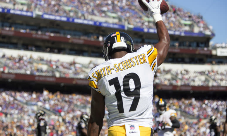 JuJu Smith-Schuster celebrating after catching a touchdown pass.