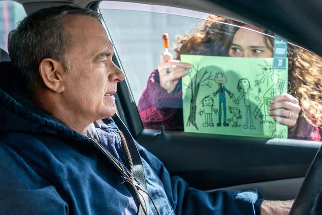 <p>Niko Tavernise/Sony Pictures Entertainment/Courtesy Everett</p> Tom Hanks and Mariana Trevino in 'A Man Called Otto,' 2022