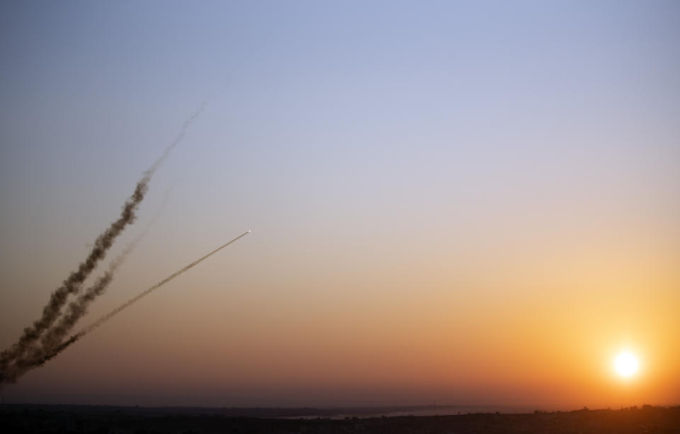 Rockets are launched from Gaza Strip to Israel, Tuesday, Nov. 12, 2019. Israel killed a senior Islamic Jihad commander in Gaza early Tuesday in a resumption of pinpointed targeting that threatens a fierce round of cross-border violence with Palestinian militants.(AP Photo/Khalil Hamra)