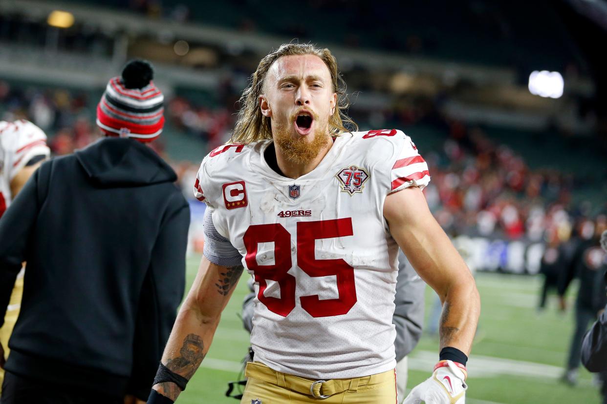 San Francisco 49ers tight end George Kittle (85) celebrates following the win in overtime against the Cincinnati Bengals at Paul Brown Stadium.