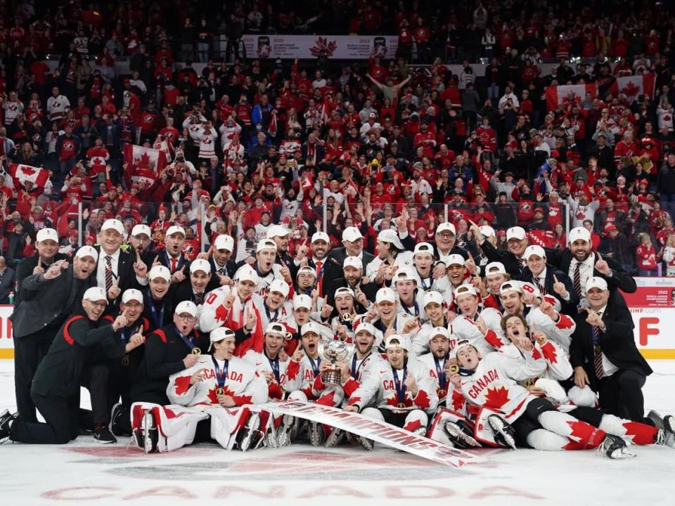 Canada poses with the trophy after its 3-2 overtime victory over the Czech Republic in the gold-medal game at the world junior hockey championship on Thursday in Halifax. (Darren Calabrese/The Canadian Press - image credit)