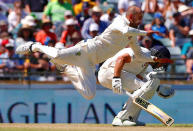 Cricket - Ashes test match - Australia v England - WACA Ground, Perth, Australia, December 14, 2017. England's Dawid Malan reacts as Australia's Nathan Lyon dives but fails to take a catch during the first day of the third Ashes cricket test match. REUTERS/David Gray