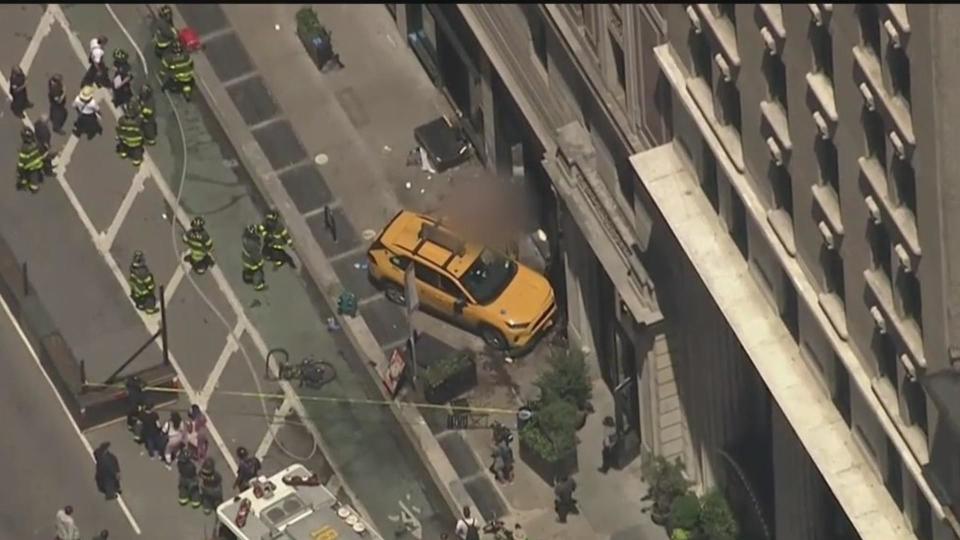 Multiple people are injured after police say a cab jumped a curb in Manhattan.  / Credit: CBS New York