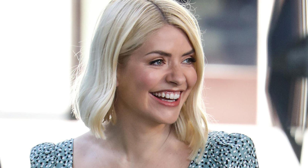 Holly Willoughby inspires our summer wardrobe in green floral dress on 'This Morning'.  (Getty Images)