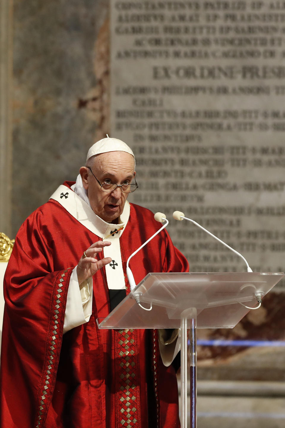 Pope Francis celebrates Mass in St. Peter's Basilica at the Vatican, Sunday, May 31, 2020. Francis celebrates a Pentecost Mass in St. Peter's Basilica on Sunday, albeit without members of the public in attendance. He will then go to his studio window to recite his blessing at noon to the crowds below. The Vatican says police will ensure the faithful gathered in the piazza keep an appropriate distance apart. (Remo Casilli/Pool Photo via AP)