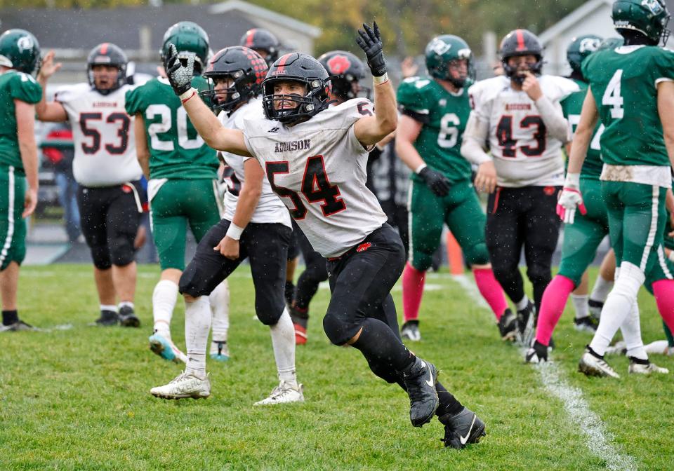 Addison's Heith Burton celebrates during the Cascades Conference championship game in Week 9 at Napoleon.