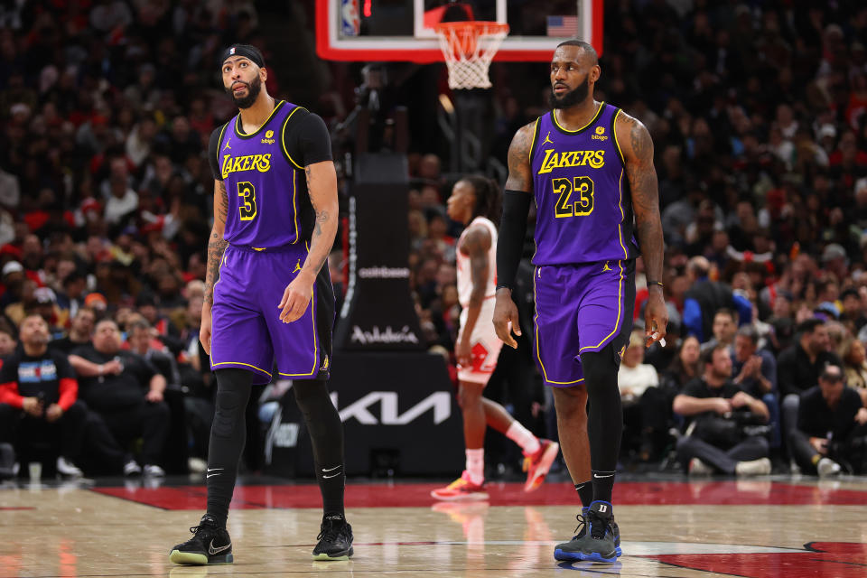 CHICAGO, ILLINOIS - DECEMBER 20: Anthony Davis #3 and LeBron James #23 of the Los Angeles Lakers look on against the Chicago Bulls during the second half at the United Center on December 20, 2023 in Chicago, Illinois. NOTE TO USER: User expressly acknowledges and agrees that, by downloading and or using this photograph, User is consenting to the terms and conditions of the Getty Images License Agreement.  (Photo by Michael Reaves/Getty Images)