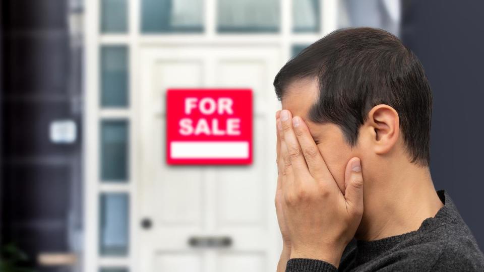 depressed man losing his house due to debts and mortgage