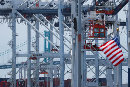 The U.S. flag flies at the Port of Los Angeles in Los Angeles, California, U.S. July 16, 2018. REUTERS/Mike Blake