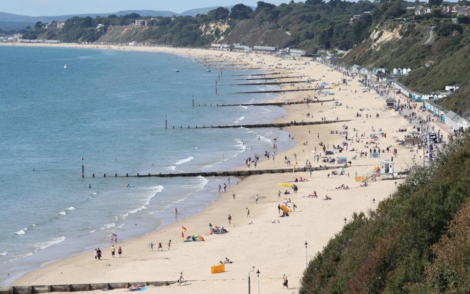 Bournemouth beach is relatively deserted for a bank holiday Monday - Jonathan Brady/PA Wire