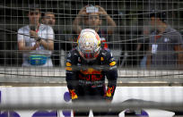 Red Bull driver Max Verstappen of the Netherlands is dejected after crashing out during the Formula One Grand Prix at the Baku Formula One city circuit in Baku, Azerbaijan, Sunday, June 6, 2021. (Maxim Shemetov, Pool via AP)
