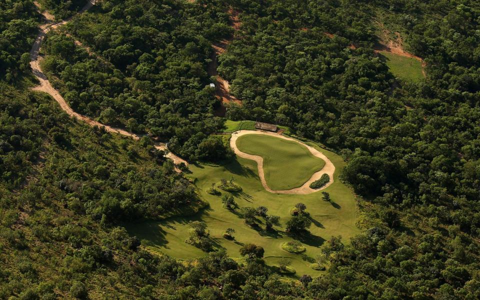 ENTABENI, SOUTH AFRICA - JANUARY 07:  A view of the Extreme 19th hole from the tee, Par 3 631m long, where the tee is at the top of Hanglip mountain and the green is the shape of Africa at the Legend Golf Course on the Entabeni Safari Reserve on January 7