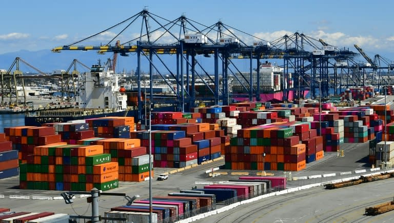 Containers are seen at the Port of Los Angeles on March 26, 2020 as the economy faces severe pressure from the coronavirus