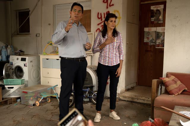 <p>AP Photo/Maya Alleruzzo</p> Israeli politician Danny Danon and former South Carolina governor Nikki Haley visit southern Israel on May 27, 2024