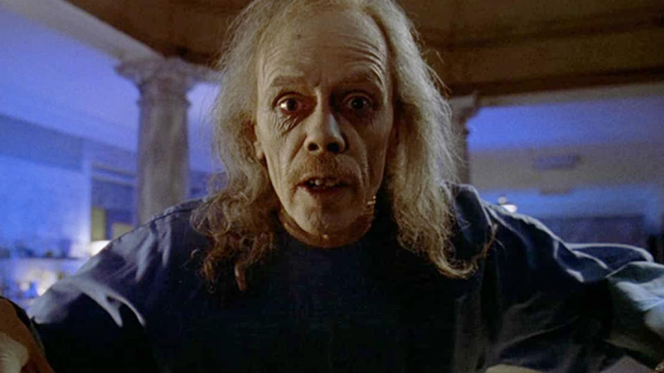 John Carpenter as The Coroner in Body Bags