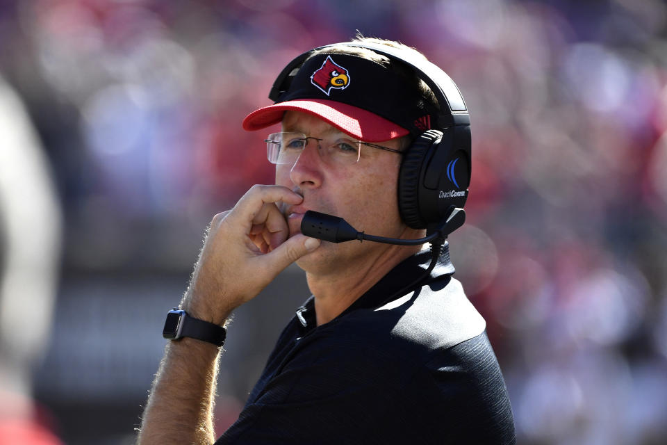 Louisville head coach Scott Satterfield watches the action during the second half of an NCAA college football game against Clemson in Louisville, Ky., Saturday, Oct. 19, 2019. Clemson won 45-10. (AP Photo/Timothy D. Easley)