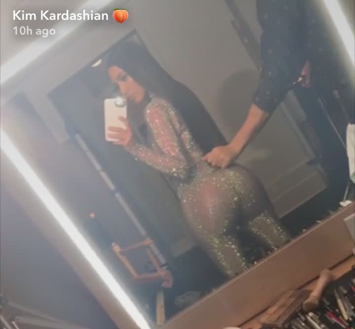 According to her Snapchat videos prior to putting on the glittery ensemble, the reality star wore nude shapewear underneath the bodysuit.<strong>&nbsp;</strong>