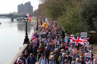<p>March to Leave protesters make their way along the River Thames (PA) </p>