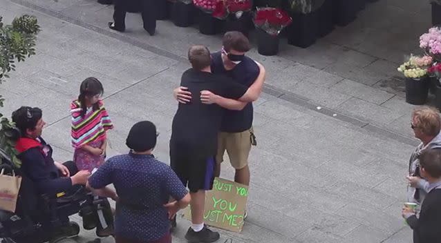 The light skinned man received plenty of attention from passersby. Photo: YouTube