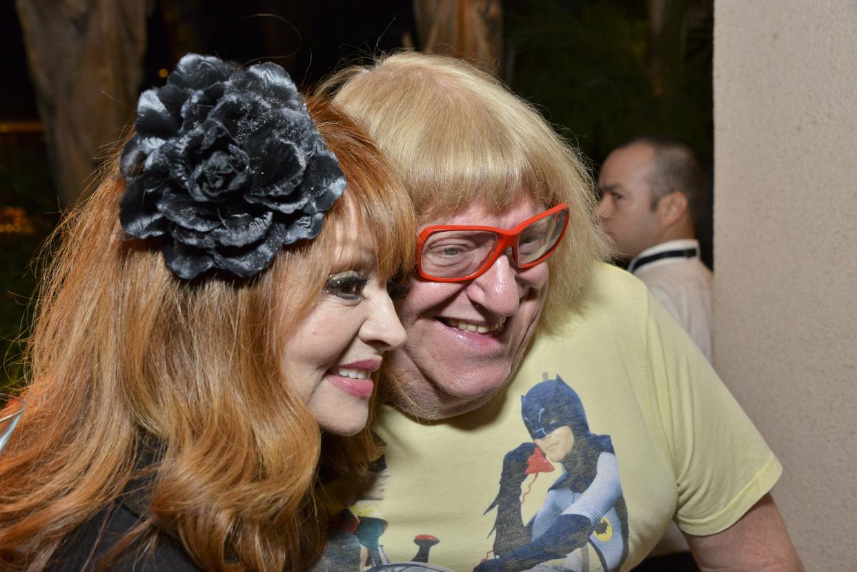 Judy Tenuta and Bruce Vilanch pose for pictures in 2014 in Palm Springs.