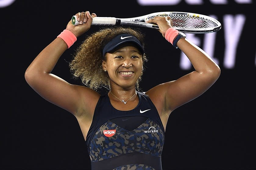 Japan's Naomi Osaka celebrates after winning the Australian Open title.