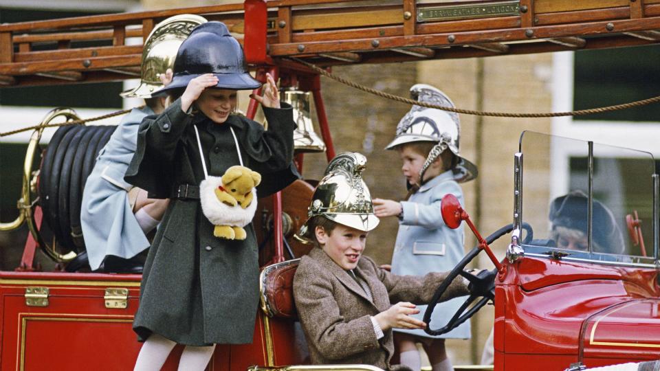 Zara Phillips, Peter Phillips And Prince Harry Playing On A Fire Engine At Sandringham, 1988