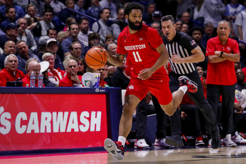 Dec 1, 2023; Cincinnati, Ohio, USA; Houston Cougars guard Damian Dunn (11) dribbles against the Xavier Musketeers in the first half at Cintas Center. Mandatory Credit: Katie Stratman-USA TODAY Sports
