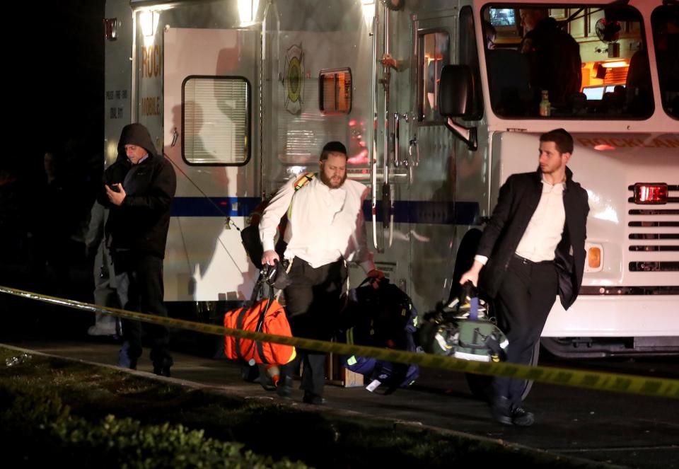 First responders work near the home of a rabbi on Forshay Rd. in Monsey, New York, after a man entered the house and stabbed multiple people who were there for a Hanukkah gathering. (Via OlyDrop)